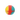 Close-up front view of a tricolor silicone sphere, the DankStop Silicone Ball Container showing yellow, red, and teal swirls against a black background