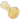 Angled close-up of the Clear DankStop Dankstop Frit Twisty Spoon Pipe - 4.5 in., showing its glossy yellow glass body with white dot frits and reflective highlights