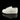 A side view of the Sneaker Pipe, resembling a white sneaker sole, is displayed on a reflective black surface.