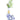 Front view of the "Luck" Water Pipe, a porcelain piece with floral detailing, softly lit against a plain white background.