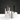 A studio shot displays the Premium Storage Tube in varying metallic colors, arranged on a reflective white surface.